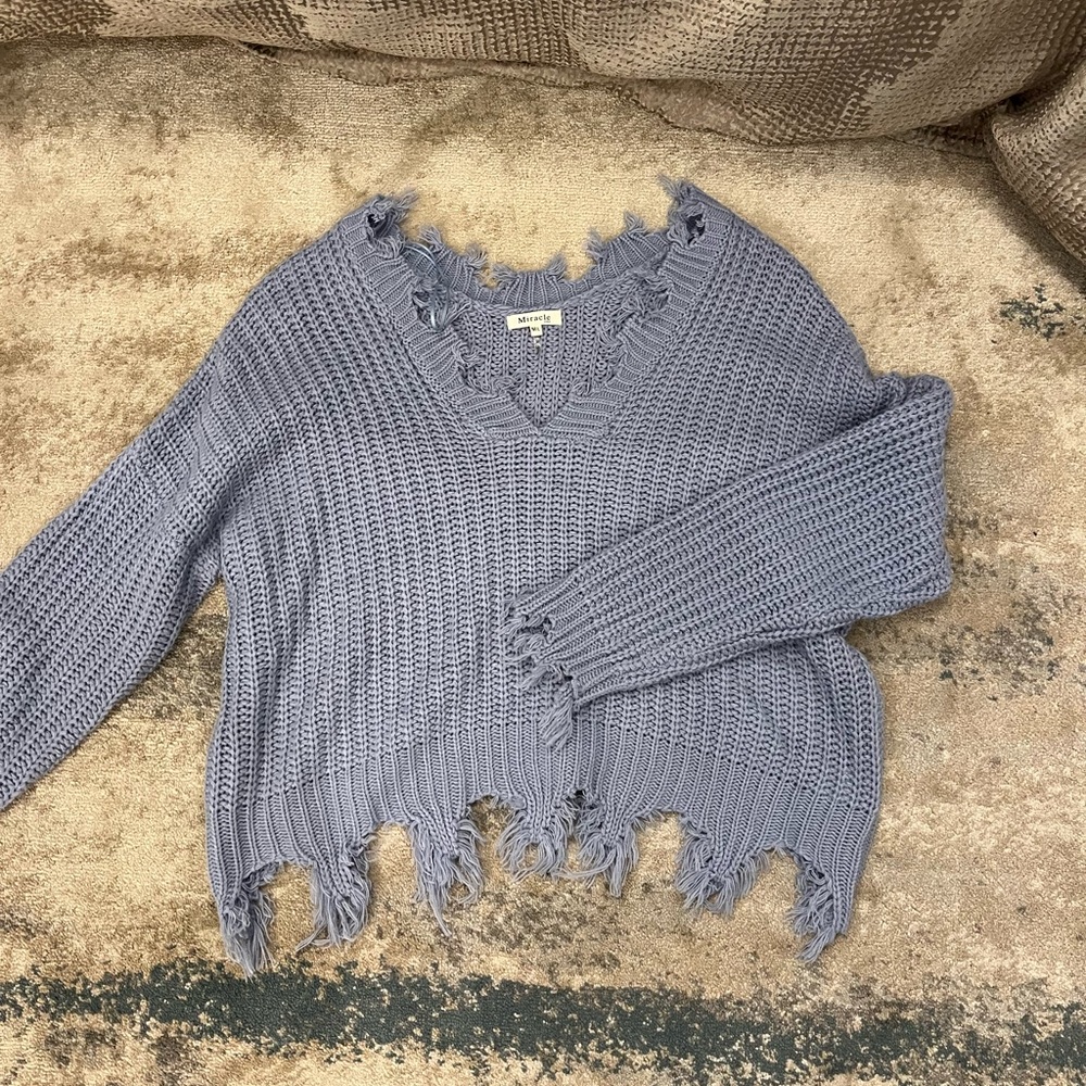 Cropped distressed sweater